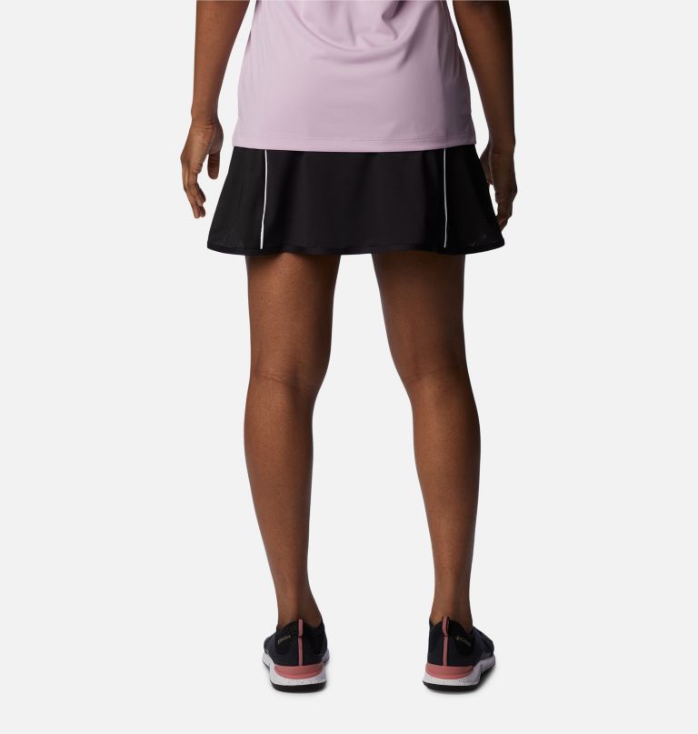 mulheres em destaque saia-calça de golfe