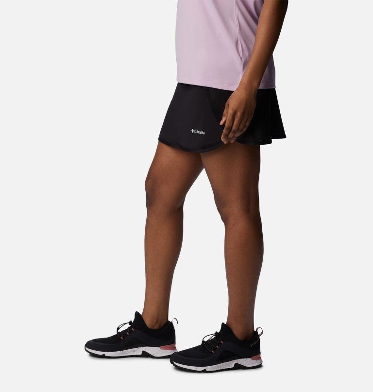 mulheres em destaque saia-calça de golfe